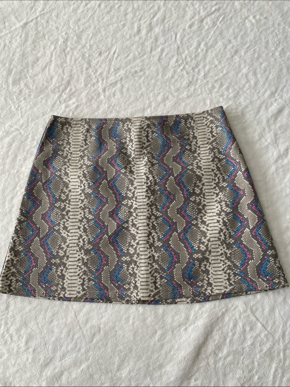 Honey Punch Gray Mini Skirt with Pink & Blue python pattern.